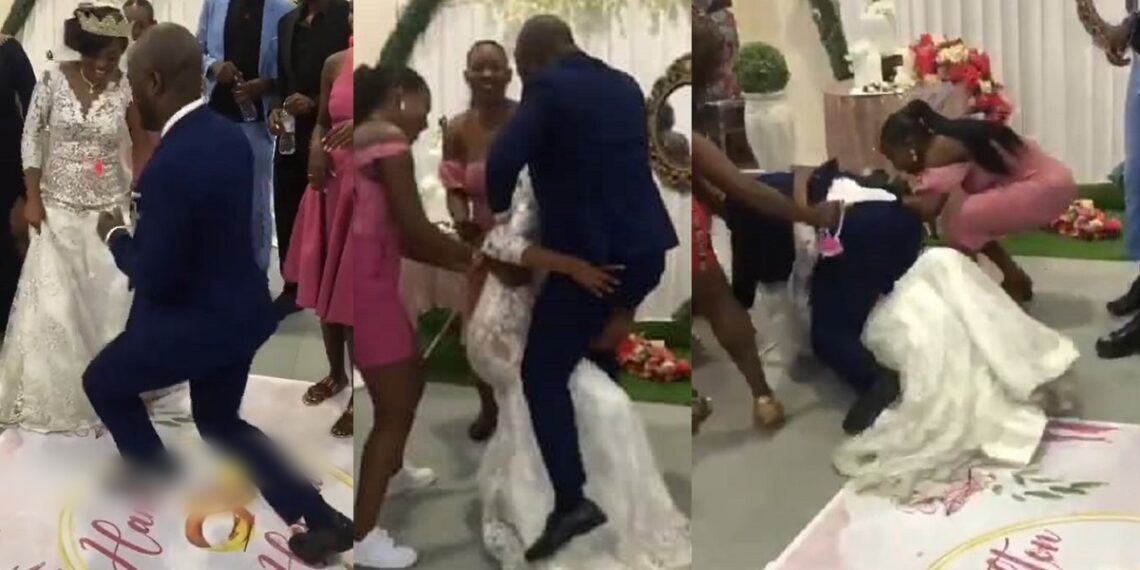 Image showcasing Moment couple suffered embarrassing fall while dancing at their wedding ...