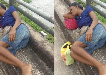 Young woman sleeps on top of bridge as flood renders residents homeless in Bayelsa community (Photo)