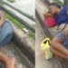 Young woman sleeps on top of bridge as flood renders residents homeless in Bayelsa community (Photo)