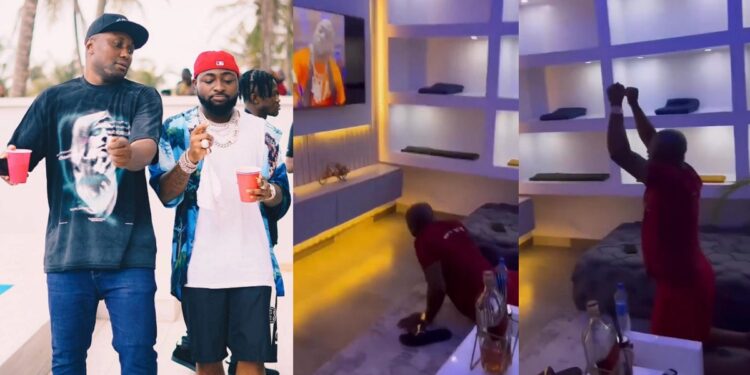 Davido’s aide, Isreal DMW, sparks reactions as he prostrates upon sighting the singer on TV (Video)