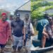 Reactions as Former President, Goodluck Jonathan enters a canoe in Bayelsa flood.