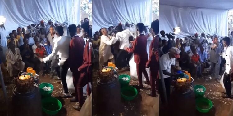 “Maybe na the wife ex” – Netizens react to video of a groom that attacked man who sprayed him money at his wedding. (Video)