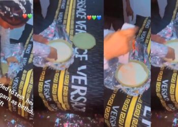 Man surprises his girlfriend with a new iPhone 14 Pro Max concealed inside bowl of garri (Video)