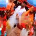 Woman spotted rubbing a bride’s face with money (video)