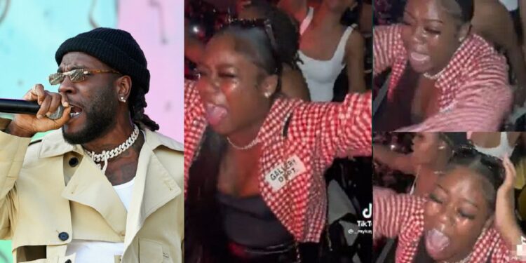“Na she sabi wetin her eyes don see” – Reactions as lady weeps profusely while singing Burna Boy’s ‘Last Last’ at his concert (Video)