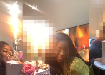 Lady’s wig catches fire while dancing with her birthday cake (video)