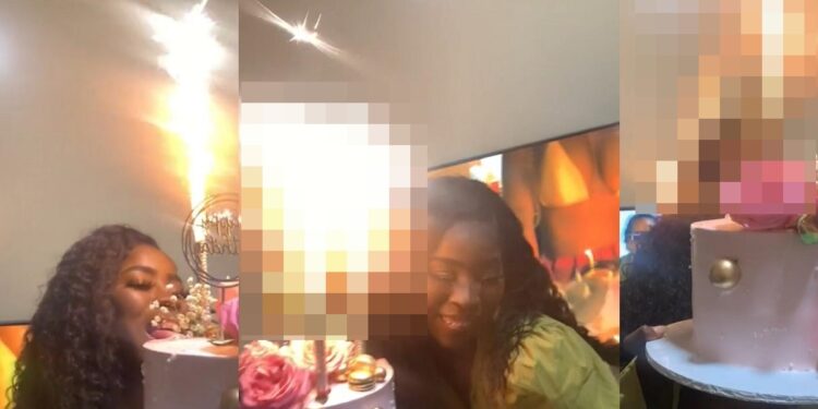 Lady’s wig catches fire while dancing with her birthday cake (video)