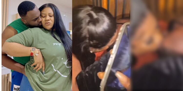 Mixed reactions as actress, Nkechi Blessing and her young lover passionately lock lips in public (Video)