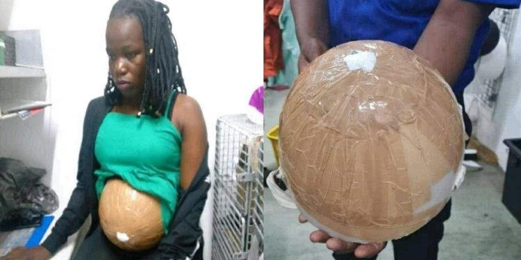 Woman caught attempting to shoplift with fake pregnancy bump.