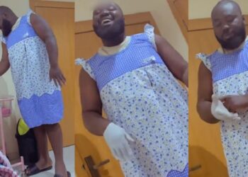 Nigerian man rocks maternity gown, dances at hospital to cheer pregnant wife in labour (Video)