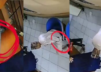 CCTV captures moment a well-dressed man stole a phone in an office (Video)