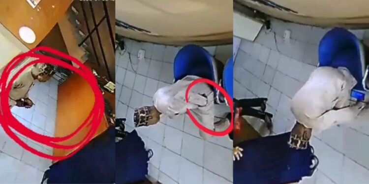 CCTV captures moment a well-dressed man stole a phone in an office (Video)