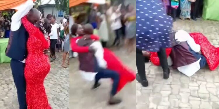 Embarrassing moment couple fell to the ground after groom attempted to carry his bride at their wedding (Video)