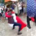 Embarrassing moment couple fell to the ground after groom attempted to carry his bride at their wedding (Video)