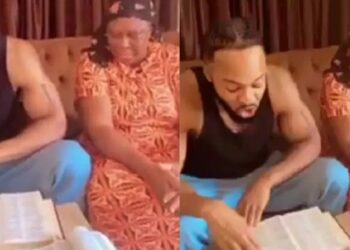 Singer, Flavour warms hearts with video of him reading Bible verse to his mum during devotion (Watch)