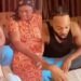 Singer, Flavour warms hearts with video of him reading Bible verse to his mum during devotion (Watch)