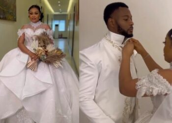 Nkiru Sylvanus steps out elegantly for her white wedding.