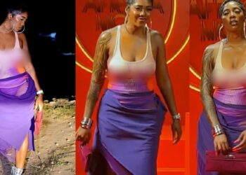 Singer, Tiwa Savage causes stir as she steps out for an event in braless see-through outfit (Video)