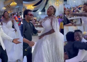 Couple shocked as singer, Olamide makes surprise appearance, performs at their wedding (Video)