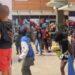 “She knows her job” – Viral video of nanny covering faces of Funke Akindele’s twins in public stirs reactions (Watch)