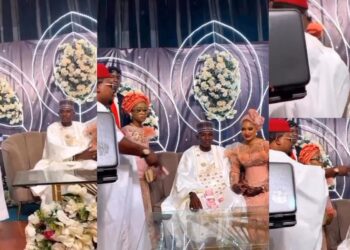 “Disrespectful!” – Netizens reacts to video of rich wedding guest spraying money on couple in an unusual manner (Video)