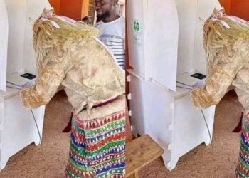 “Even the gods want better life” – Reactions as a masquerade  is spotted casting vote in Lagos