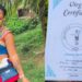 Mixed reactions as pretty lady proudly flaunts her certificate of virginity