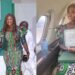 HOR member-elect, Odiasen Okojie dedicates his certificate of return to his wife, Mercy Johnson