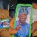 Man angrily takes back iPhone from his babe after seeing Tinubu as her wallpaper (Video)