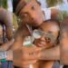 “A slap on Jada” – Netizens react to video of Wizkid all loved up with mystery lady, calling her girlfriend (Watch)