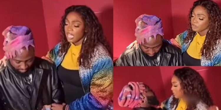 Heartwarming video of Davido’s sister, Sharon, passionately praying for him before his London concert surfaces (Watch)