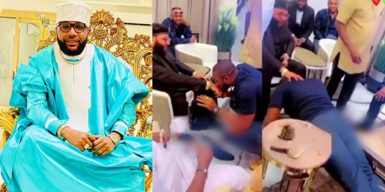 Mixed reactions as man bows to kiss billionaire E-Money’s hands and feet (Video)