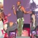 “His wife dey backstage” – Reactions as Adekunle Gold moves away from dancer who tried to rock him on stage (Video)