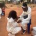 “Na interhouse sports dem dey do?” – Reactions as couple turn up for their traditional wedding ceremony in sports outfit