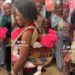 “Mothers have superpowers” – Trending video of mother carrying her triplets at once stirs reactions (Watch)