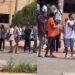Student allegedly beaten by course mates for covering booklet in exam hall (Video)