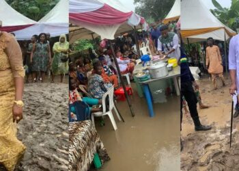 Newlywed couple and their guests defy heavy rain to celebrate their wedding