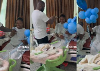 Man makes money rain on his wife as she delivers a baby boy (video)
