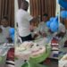 Man makes money rain on his wife as she delivers a baby boy (video)