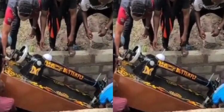 “Sew till thy kingdom come” – Reactions as tailor is buried inside sewing machine shaped coffin (Video)