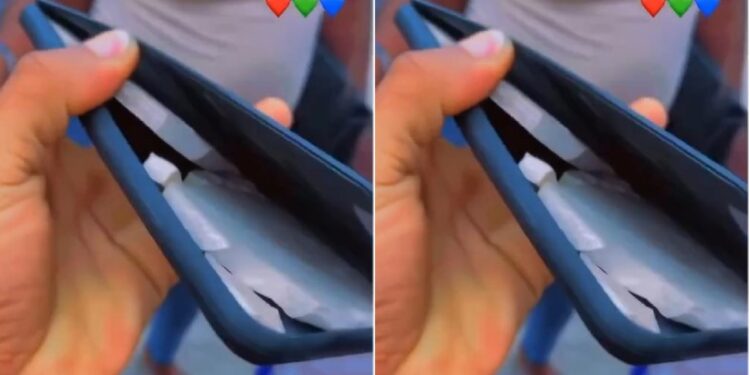 Lady in pains after seeing tiles inside iPhone she allegedly bought at computer village