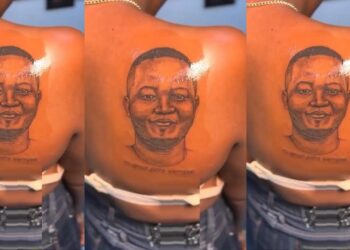 “When them break up she go cut that place comot” – Reactions as lady tattoos her boyfriend’s face on her back