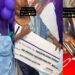 “Where una dey see friends wey dey spoil una” – Netizens react to viral video of lady surprising her best friend with 100k, money bouquet and other gift item (VIDEO)