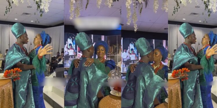 Viral Video Sparks Controversy As Nigerian Bride Avoids First Kiss With Her Husband (WATCH)