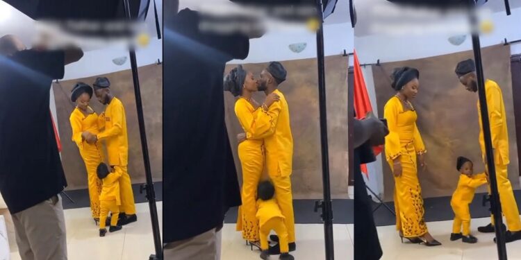 “I talk am! Nah man dey do man” – Kid pushes dad away from his mum during a photoshoot session (VIDEO)