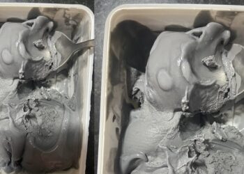 “Na cement flavor” – Reactions as lady shows off the ‘charcoal lychee’ Ice cream she’s consuming