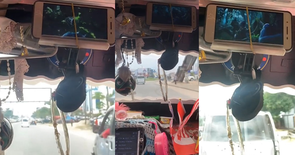 “Na you go Dey book bolt” – Lady astonished as she boards a public bus with customized TV cinema in Port Harcourt (VIDEO)