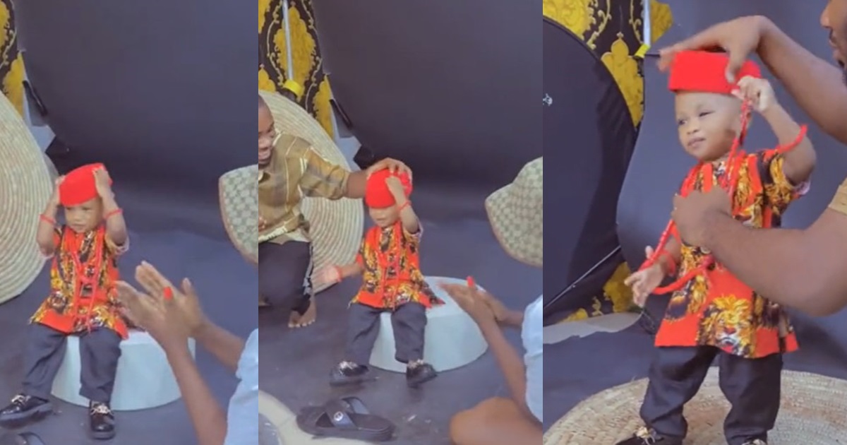 “Igwe no wan rule kingdom again” – Hilarious moment a toddler refuses to take picture for his 1year birthday photoshoot (WATCH)