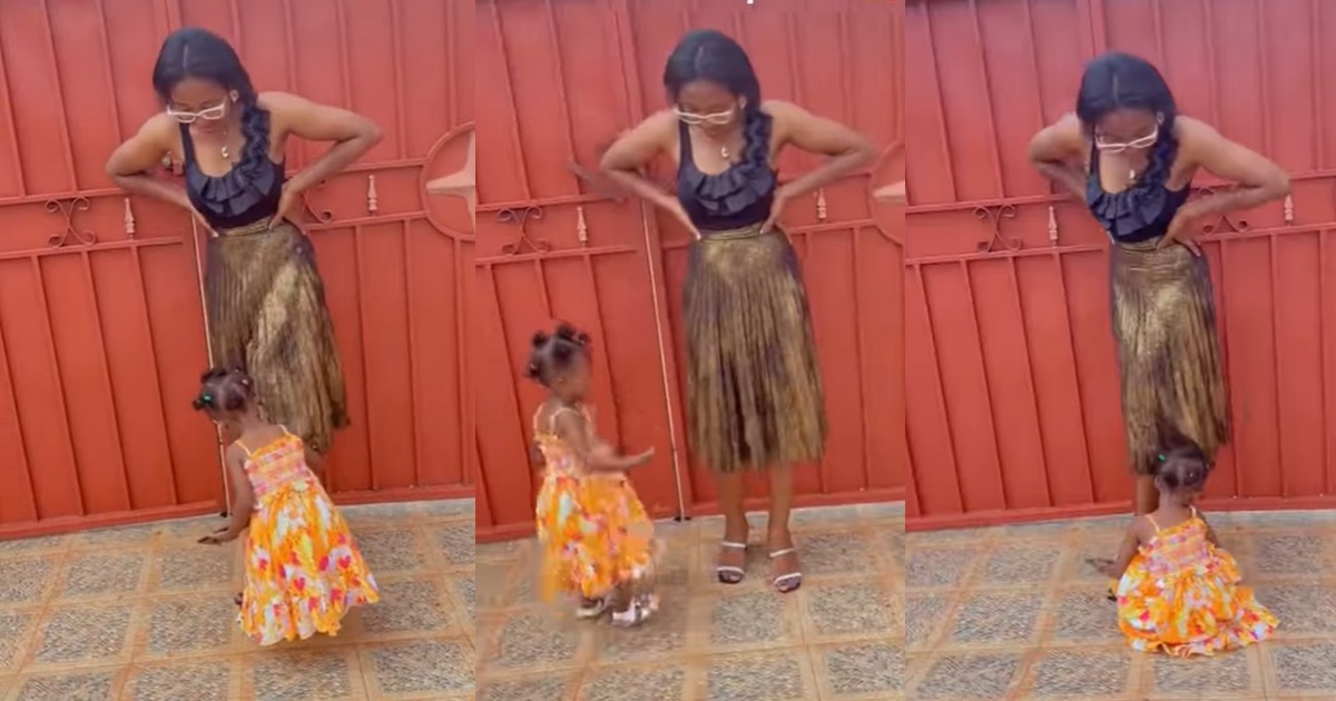 “I need to hire this little girl” – Little girl mǝlt hearts as she helps her mum strike a pose to take a picture (WATCH)