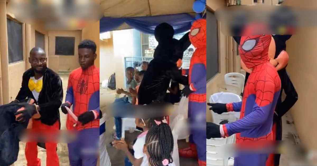 “From the law to spiderman” – First class law graduate turns into party ‘Spiderman’ for daily bread amid economic h@rdship (VIDEO)